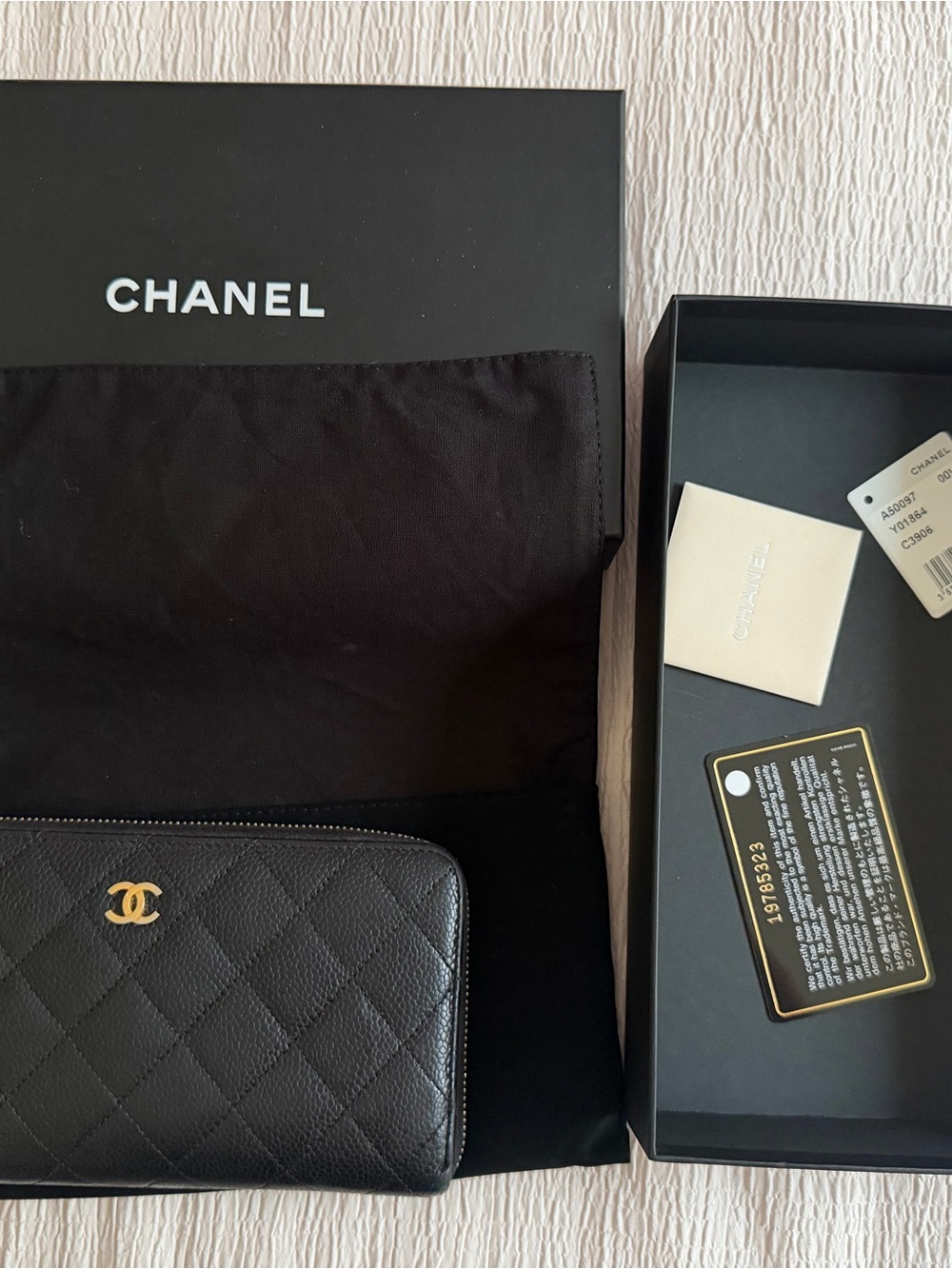 AUTHENTIC CHANEL Black Quilted Zip Wallet with Gold CC Emblem